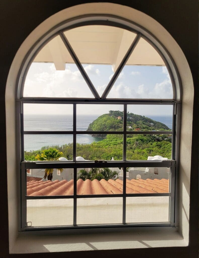 photo of the view from villa looking out at the ocean and peninsula