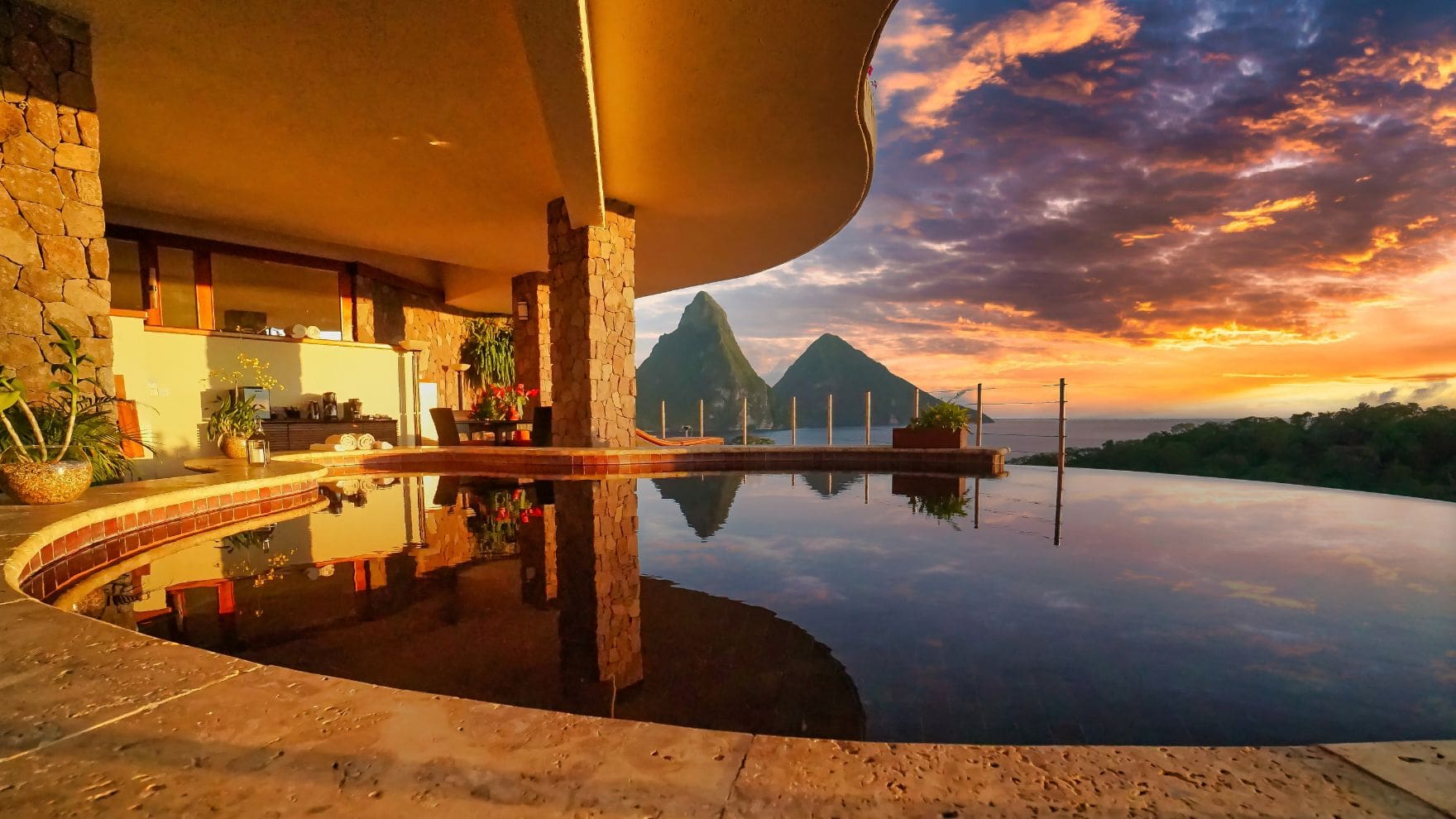 photo from Jade Mountain Resort of the Pitons at sunset from a pool