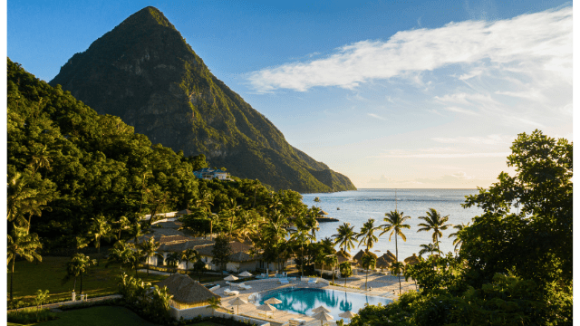 photo of beach pool and beach at Sugar Beach with Petit Piton behind it in St Lucia