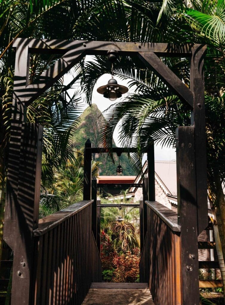 photo of walkway at the Rabot Hotel in St. Lucia with the Pitons behind it