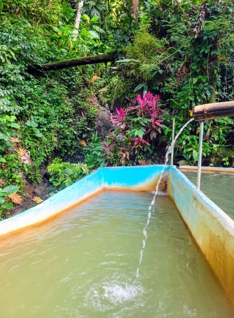 photo of water flowing into pool at New Jerusalem Mineral Pools in St. Lucia