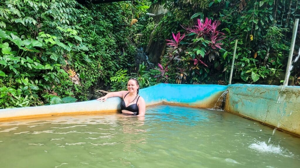 photo of woman in New Jerusalem Mineral Bath in St Lucia