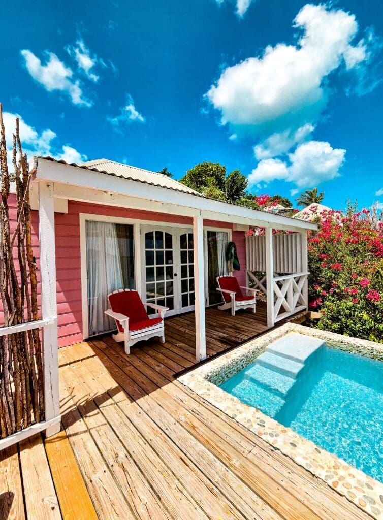 photo looking at cottage from pool edge