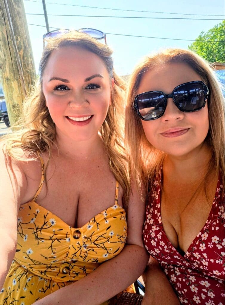 two girls smiling on the Louisiana swamp tour 