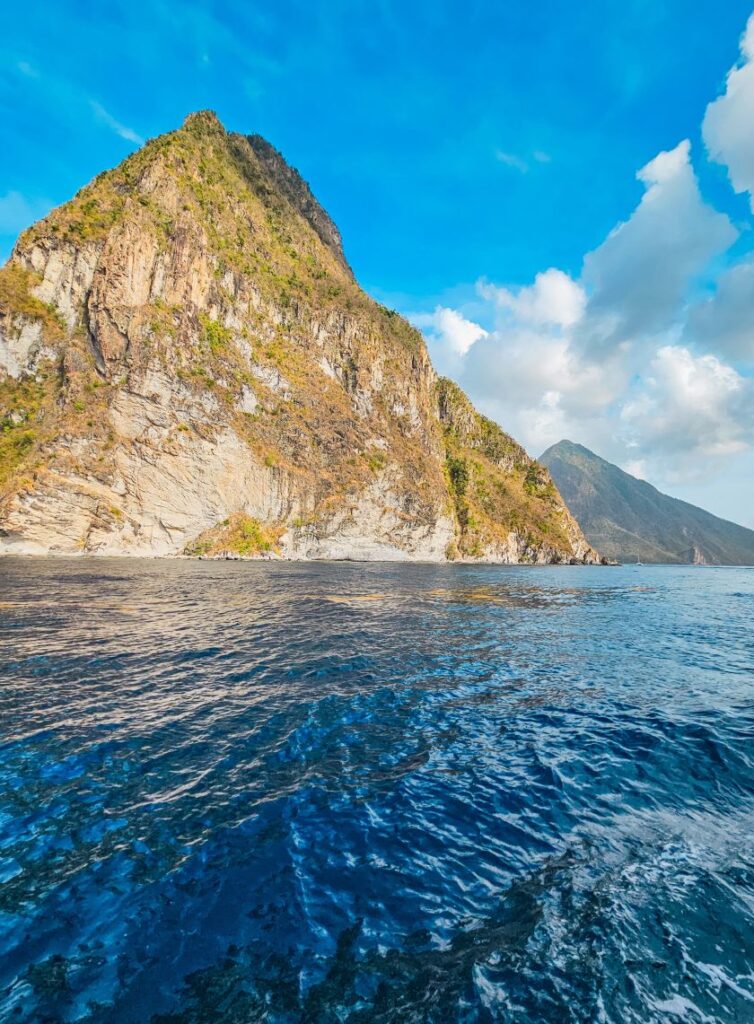 photo of pitons from the water in St. Lucia