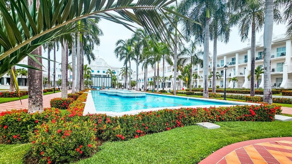 photo of fountain with hotel in the background at Riviera Maya