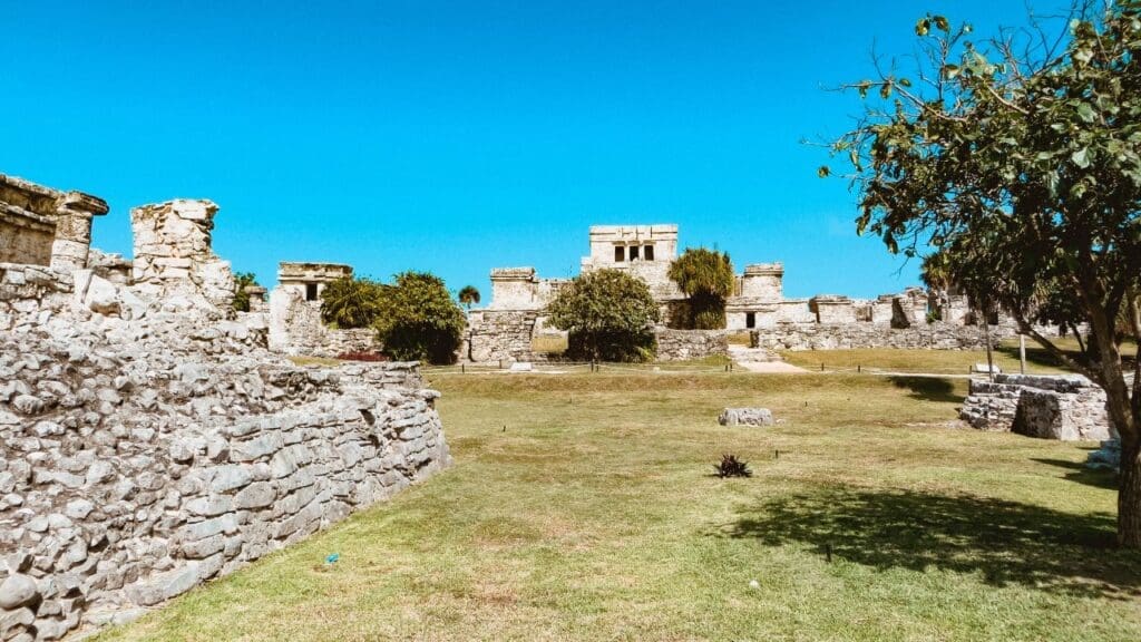 photo of El Castillo in the distance at the Tulum Ruins