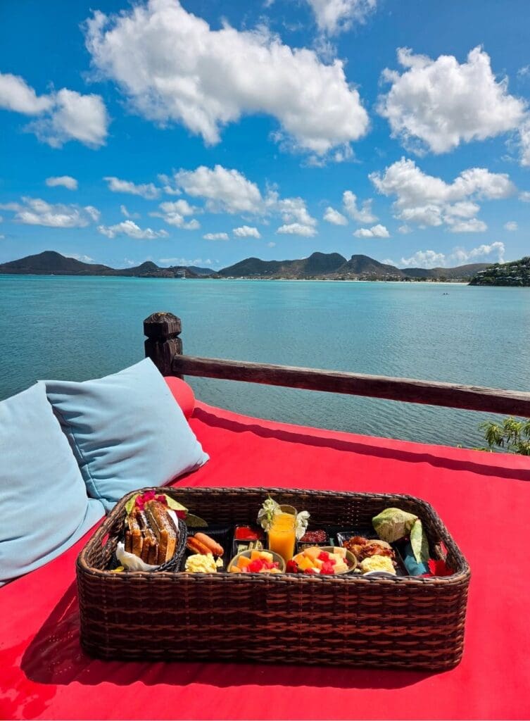 photo of floating breakfast basket on daybed in Antigua