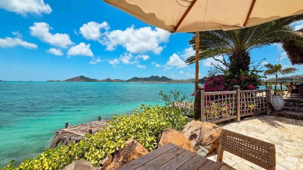 view from table at cliffside restaurant in Antigua