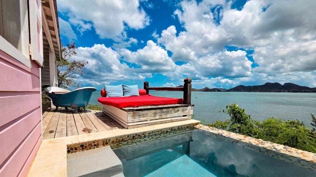 photo of daybed, soaker tub, and plunge pool at cottage in Antigua