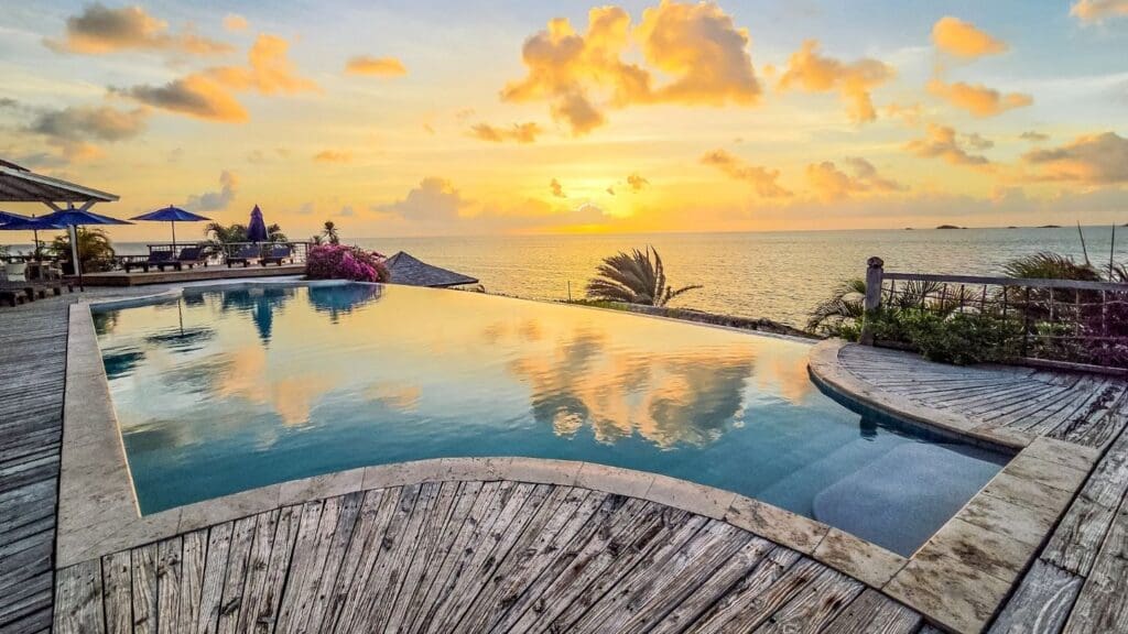 photo of sunset from infinity pool at Cocobay in Antigua