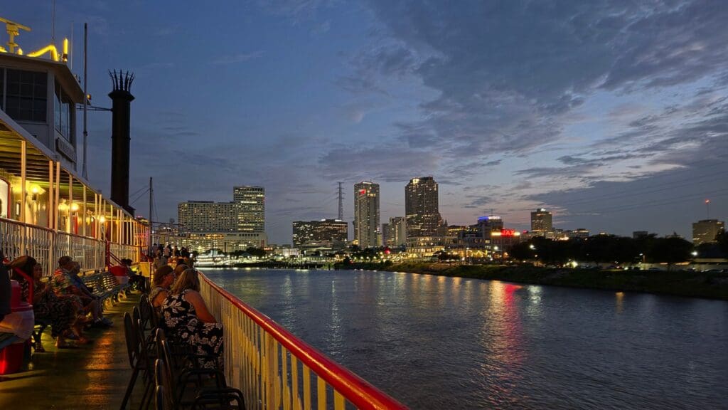 photo of New Orleans lit up from steamboat