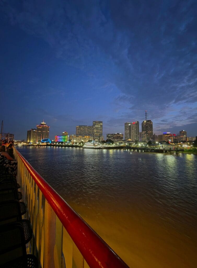 photo of New Orleans lit up from the Mississippi River