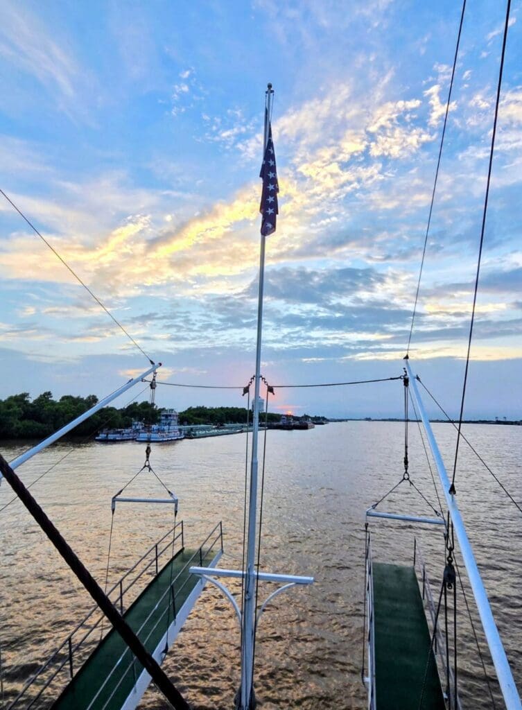 photo of sunset on steamboat sunset cruise down the Mississippi River in New Orleans