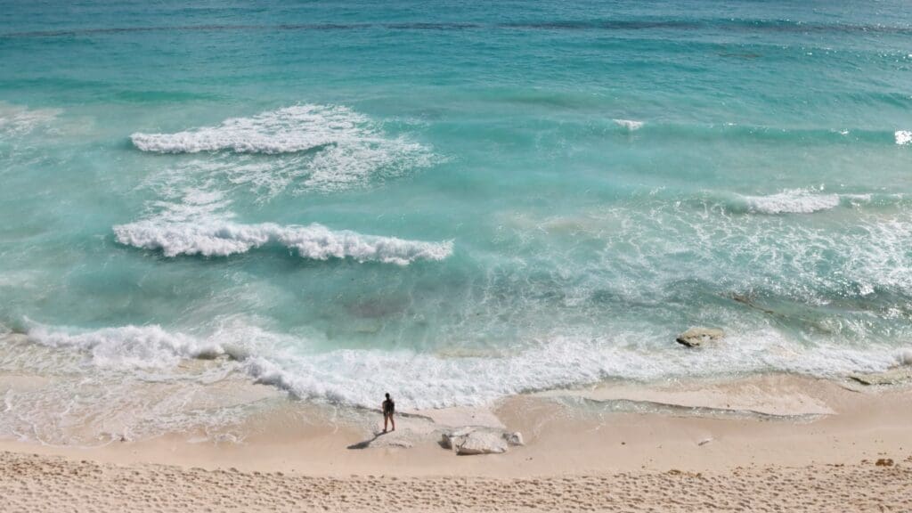 photo of waves and beach in Cancun Mexico