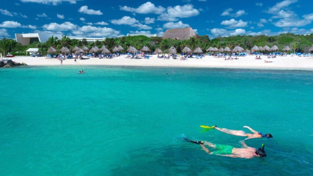 photo of people snorkeling outside of Grand Sirenis Riviera Maya Resort & Spa