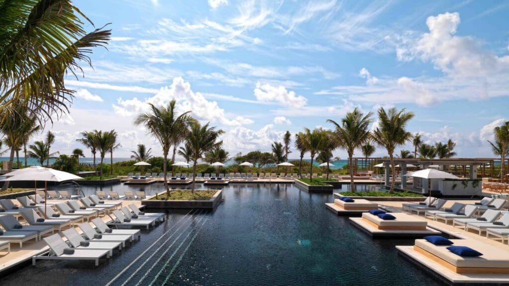 photo of pool and lounge chairs at UNICO 20°87° Hotel Riviera Maya