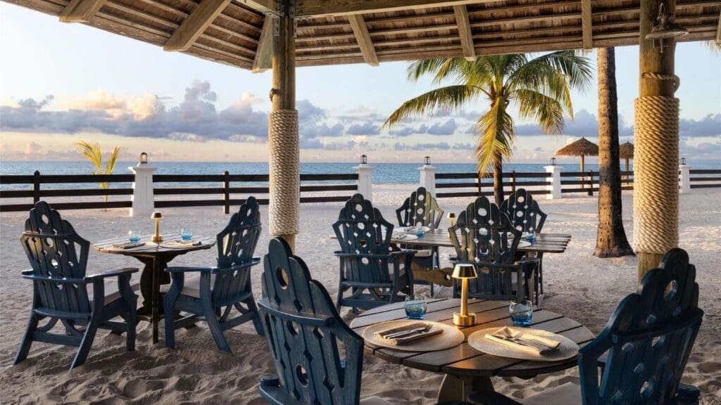 photo of outdoor restaurant by the beach at Sandals Grande Antigua