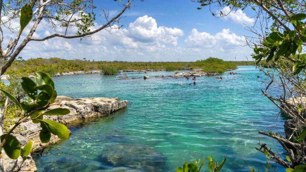 photo of people snorkeling at Yal-Ku Lagoon in Mexico