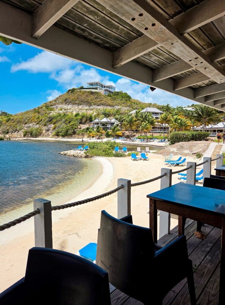 view of beach and bar at The Escape at Nonsuch Bay in Antigua