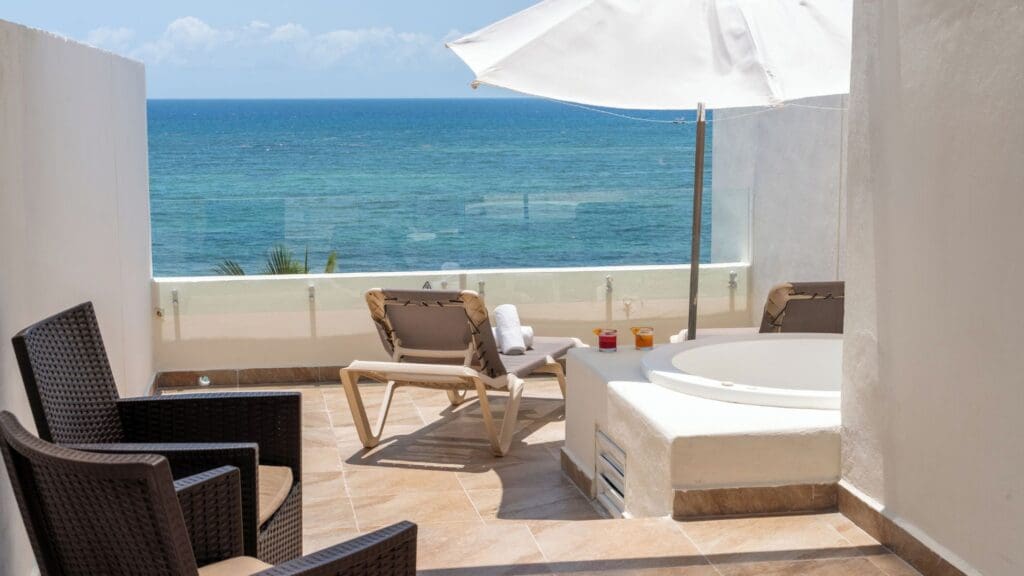 deck with lounge chairs and private plunge pool in Akumal